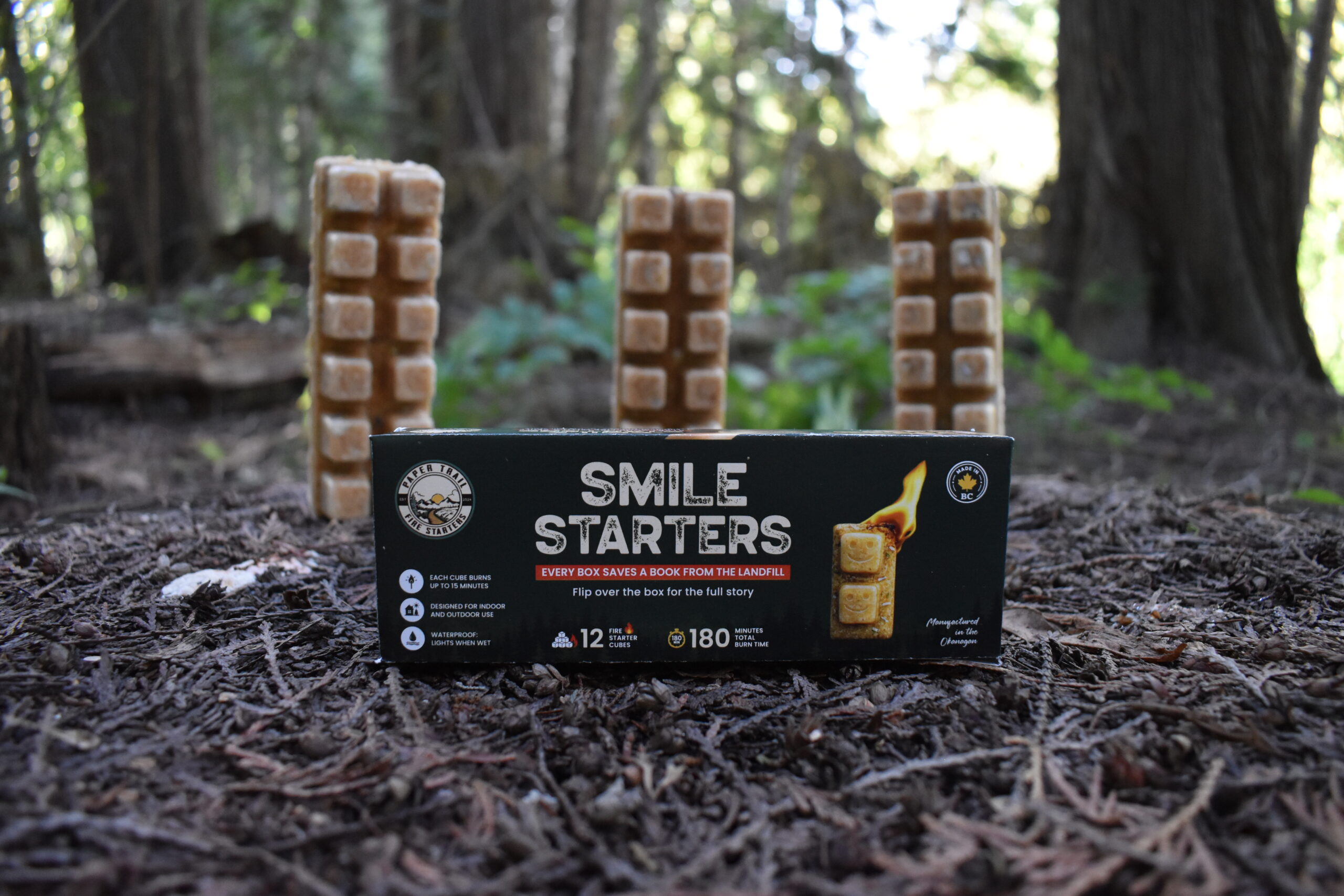 Smile Starters retail packaging with three starter bars in the woods